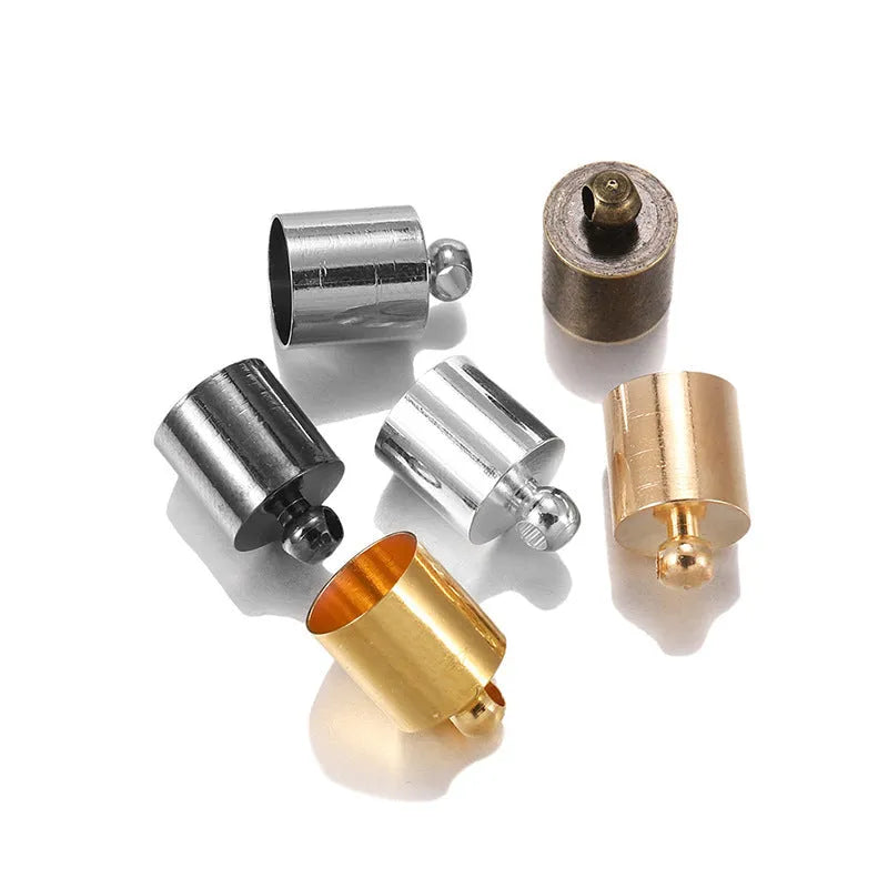 Assortment of small, shiny copper weight caps in various sizes and metallic colours for jewellery making.