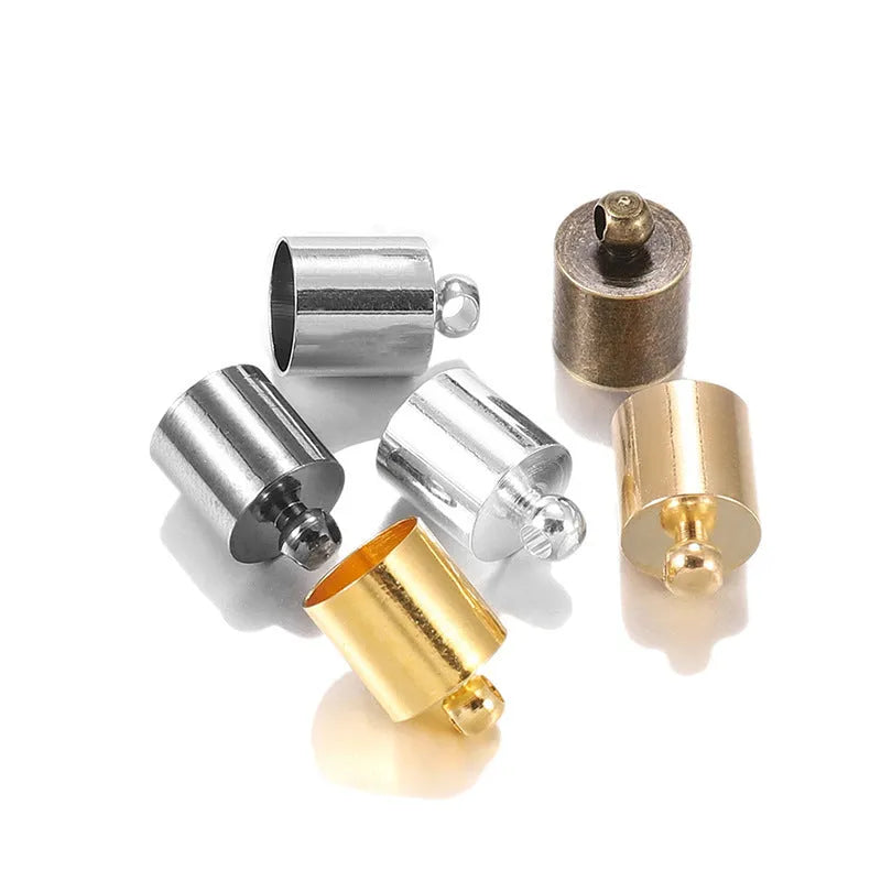 Assortment of small, shiny copper weight caps in various sizes and metallic colours for jewellery making.