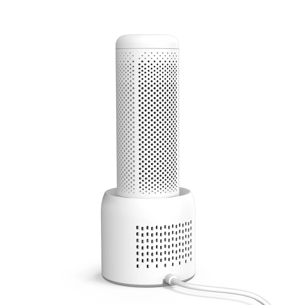 White mini household dehumidifier with 1 litre tank for rooms under 10 square metres