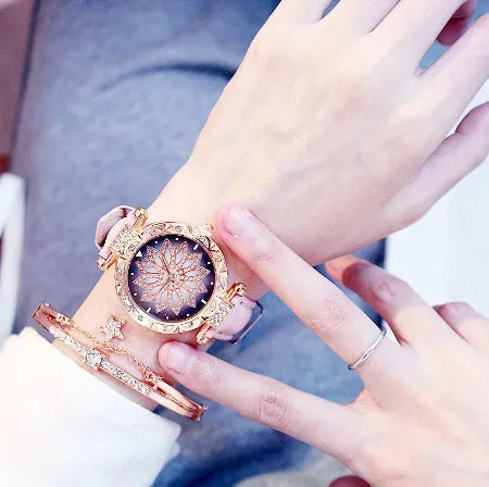 Women's fashion watch with diamond bezel, round 32mm dial, available in multiple colours on a pin buckle strap.