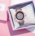 Women's fashion watch with diamond bezel, round 32mm dial, available in multiple colours on a pin buckle strap.