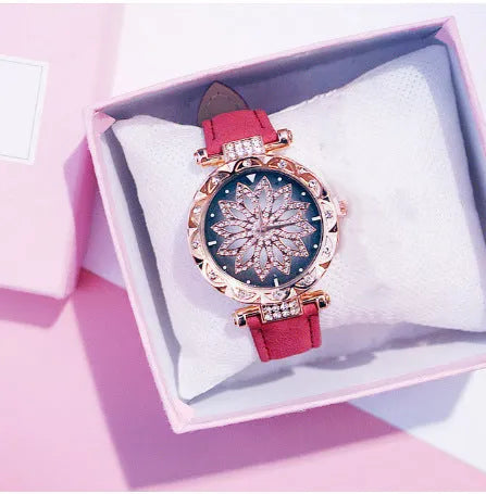 Women's fashion watch with diamond bezel, round 32mm dial, available in multiple colours on a pin buckle strap.