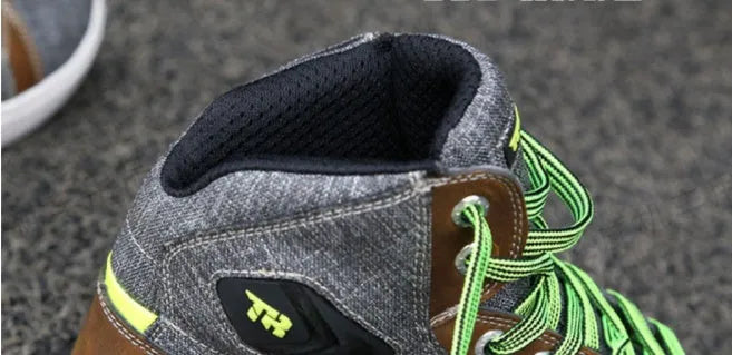 Men's black and grey casual short boots for motorcycle riding with breathable and non-slip features.
