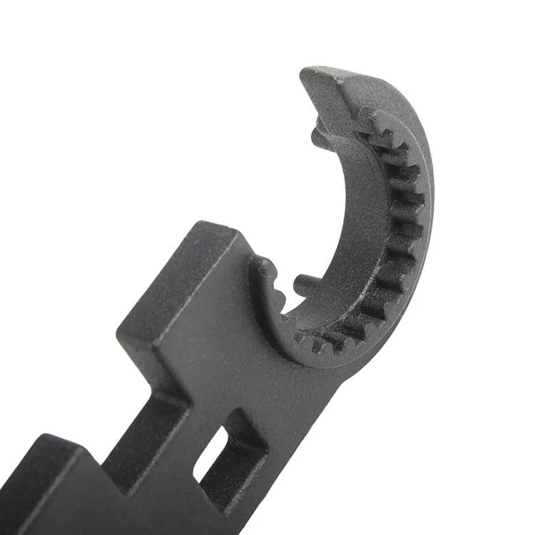 Black combination wrench for AR15 and M4 rifle maintenance with dual-purpose design