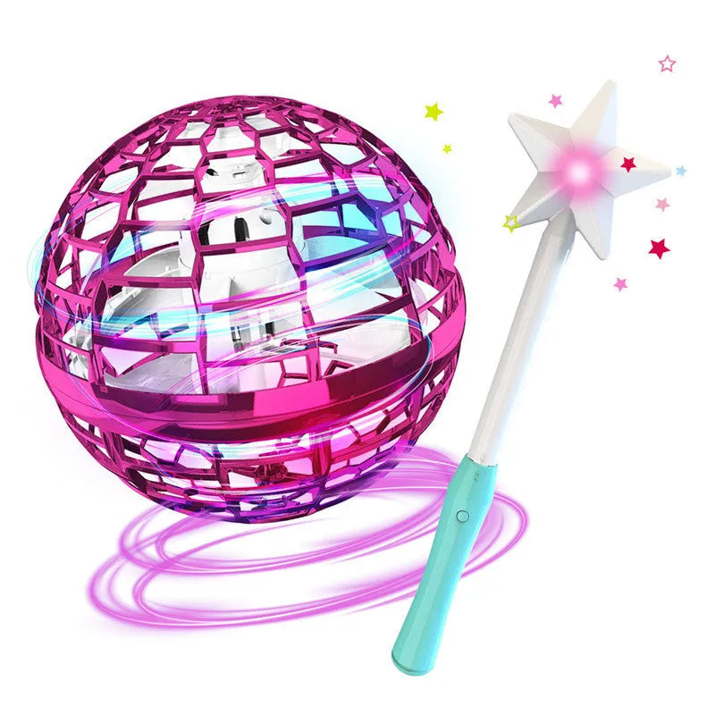Blue LED spinning flying ball toy and magic wand set on a neutral background.