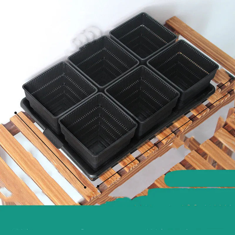 Meishi Controlled Root Flower Pot showing black and white resin pots with tray