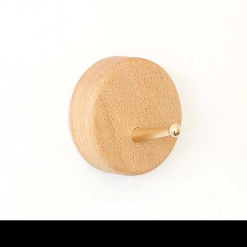 Beech wood adhesive wall hook with brass hook in five shape options including round, capsule, oval, diamond and square