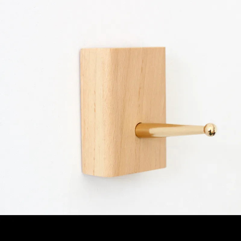 Beech wood adhesive wall hook with brass hook in five shape options including round, capsule, oval, diamond and square
