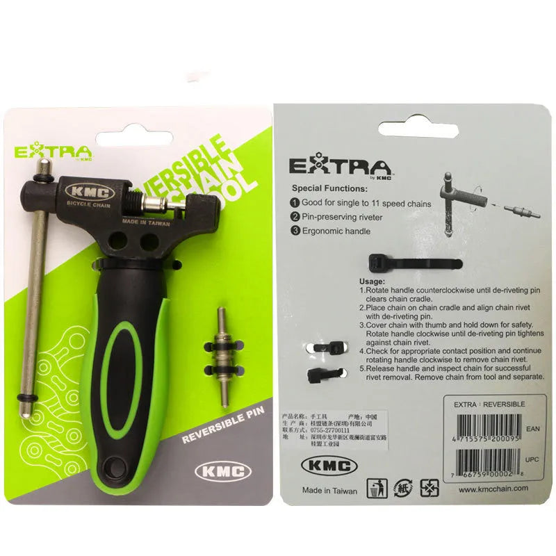 Green steel bicycle chain cutter with a double shaft device and a separate chain driver on a workbench.