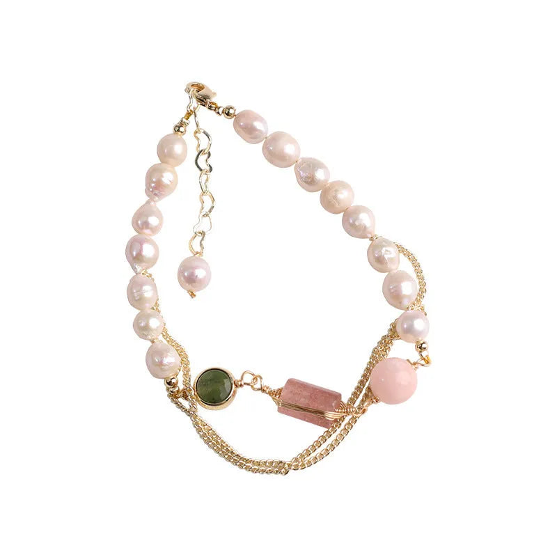 Women's pink freshwater pearl bracelet with geometric design and strawberry crystal charm