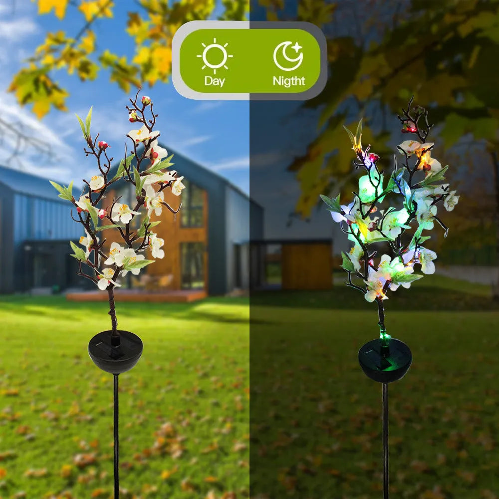 Solar-powered cherry blossom string lights with ground spike for outdoor garden decoration