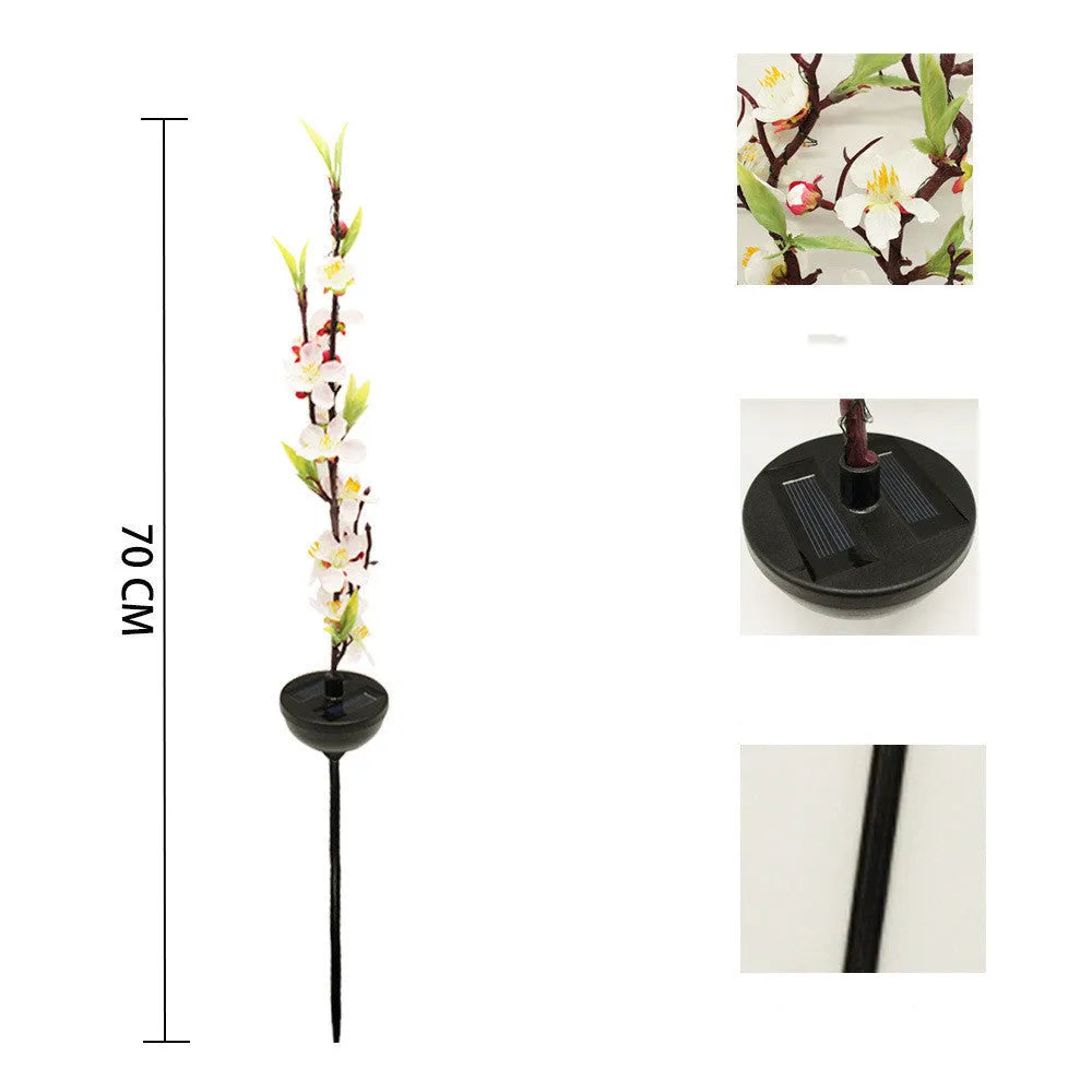 Solar-powered cherry blossom string lights with ground spike for outdoor garden decoration