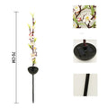 Solar-powered cherry blossom string lights with ground spike for outdoor garden decoration