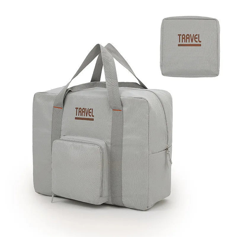 Cube-shaped travel storage bag in black, grey, khaki, or pink, made from 300D Oxford cloth.
