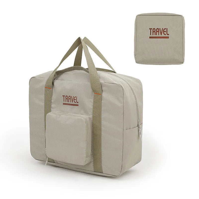 Cube-shaped travel storage bag in black, grey, khaki, or pink, made from 300D Oxford cloth.