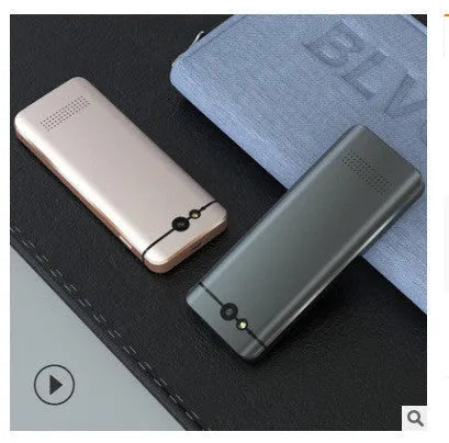M9 translator device in gold or silver grey plastic construction with group chat and photo translation functions