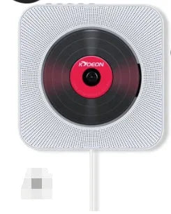 Wall-mounted white CD and DVD player unit with display, remote control, and mounting board.
