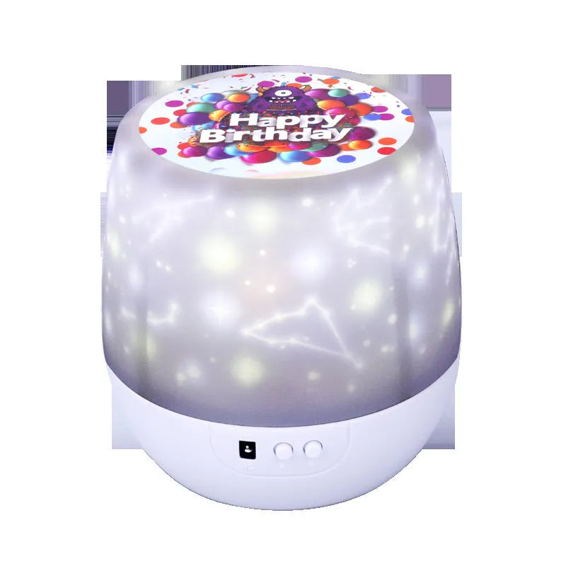 Bluetooth star projector showing cosmic light projection with plastic shade and push-button controls