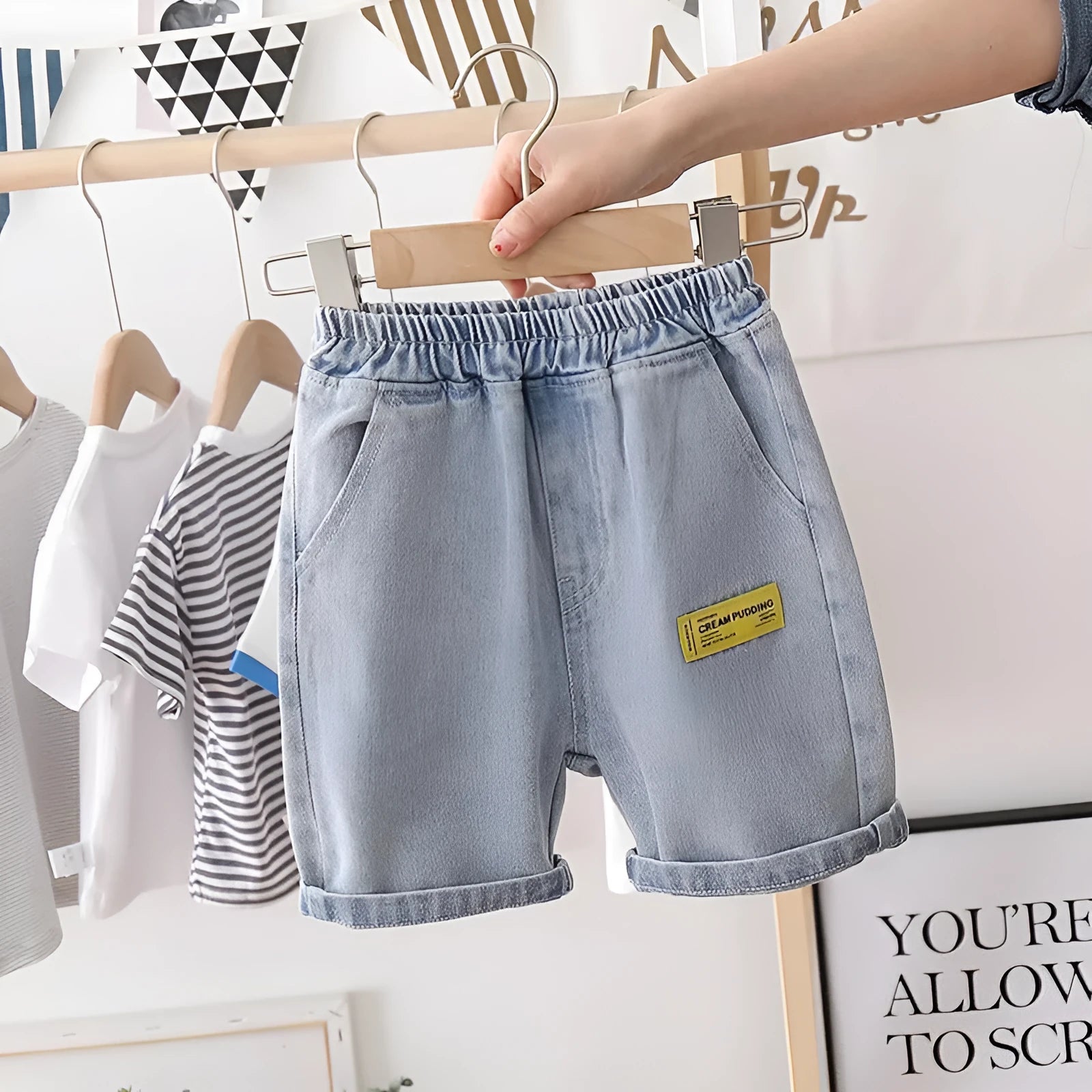 Boys blue denim-look casual cotton shorts for summer on white background
