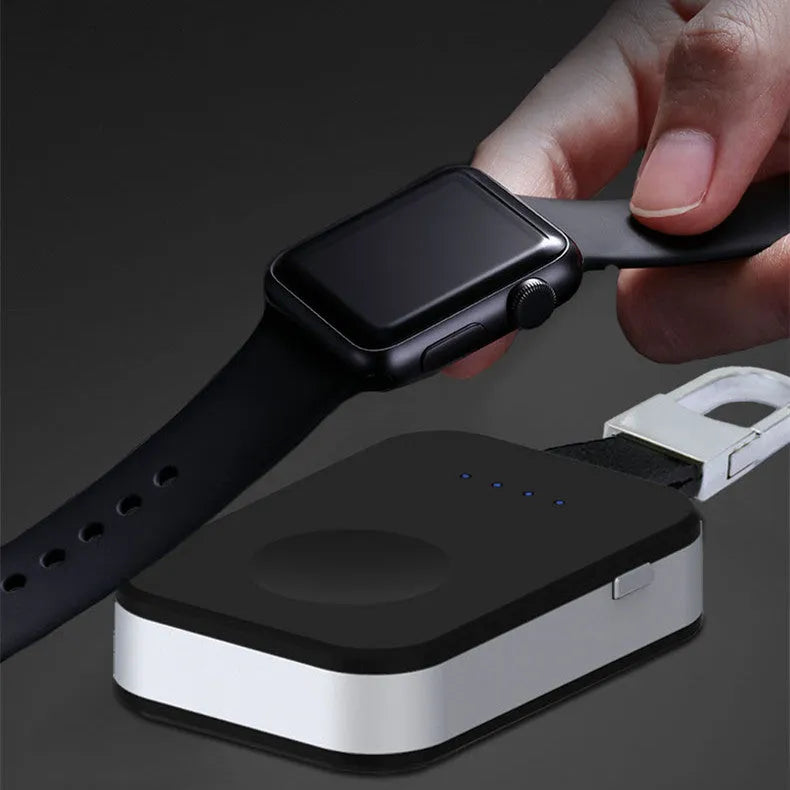 Black Apple Watch keychain power bank showing wireless charging surface and compact size