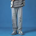 Men's loose fit washed cotton jeans in light blue with printed design and zipper fly, available in sizes M to 5XL