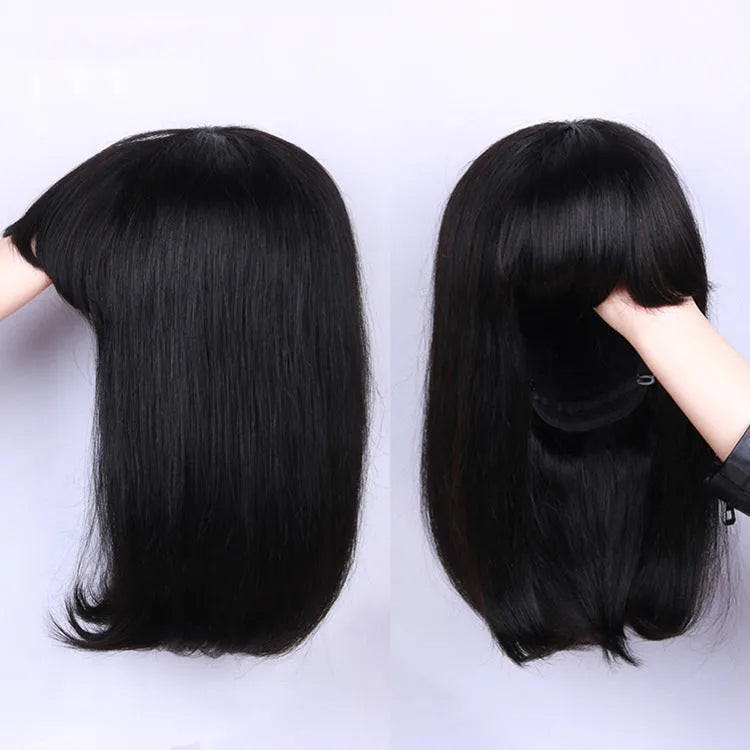 Black human hair wig showing 10 inch short to medium length on a model