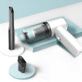 Wireless car vacuum cleaner in black or white with compact ABS plastic design for vehicle interior cleaning
