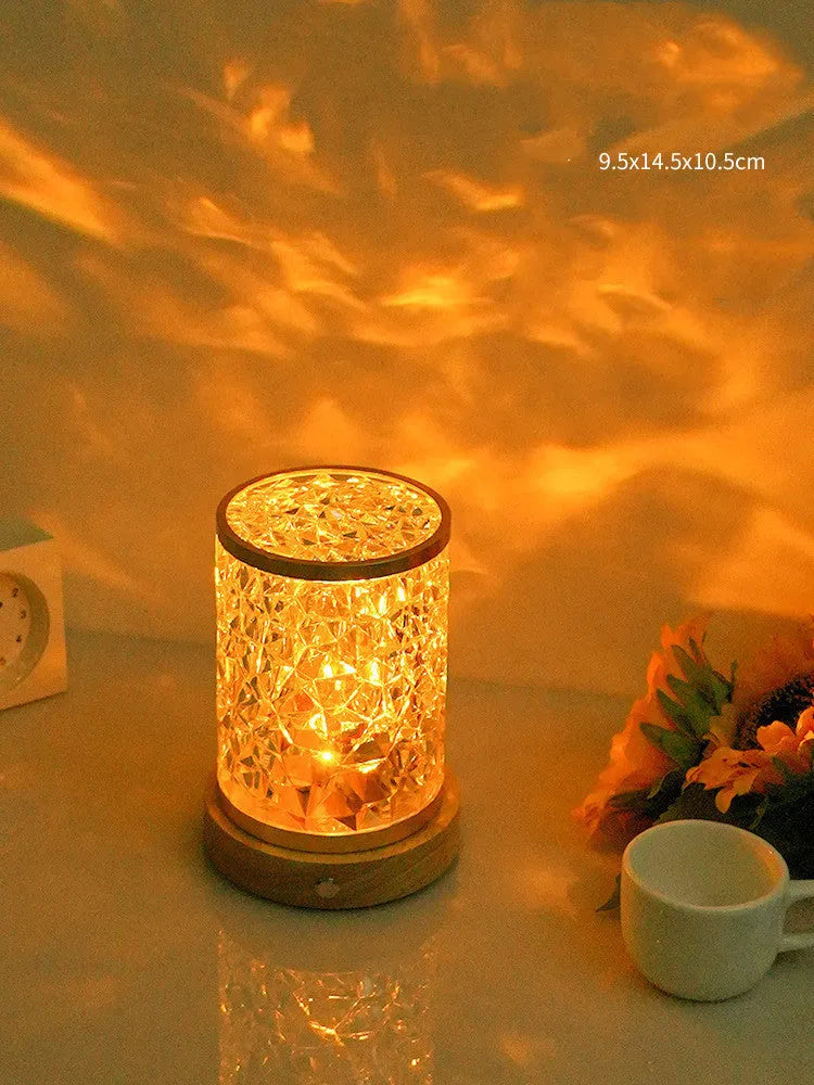 Small rotating water ripple night light with acrylic shade on solid wood base