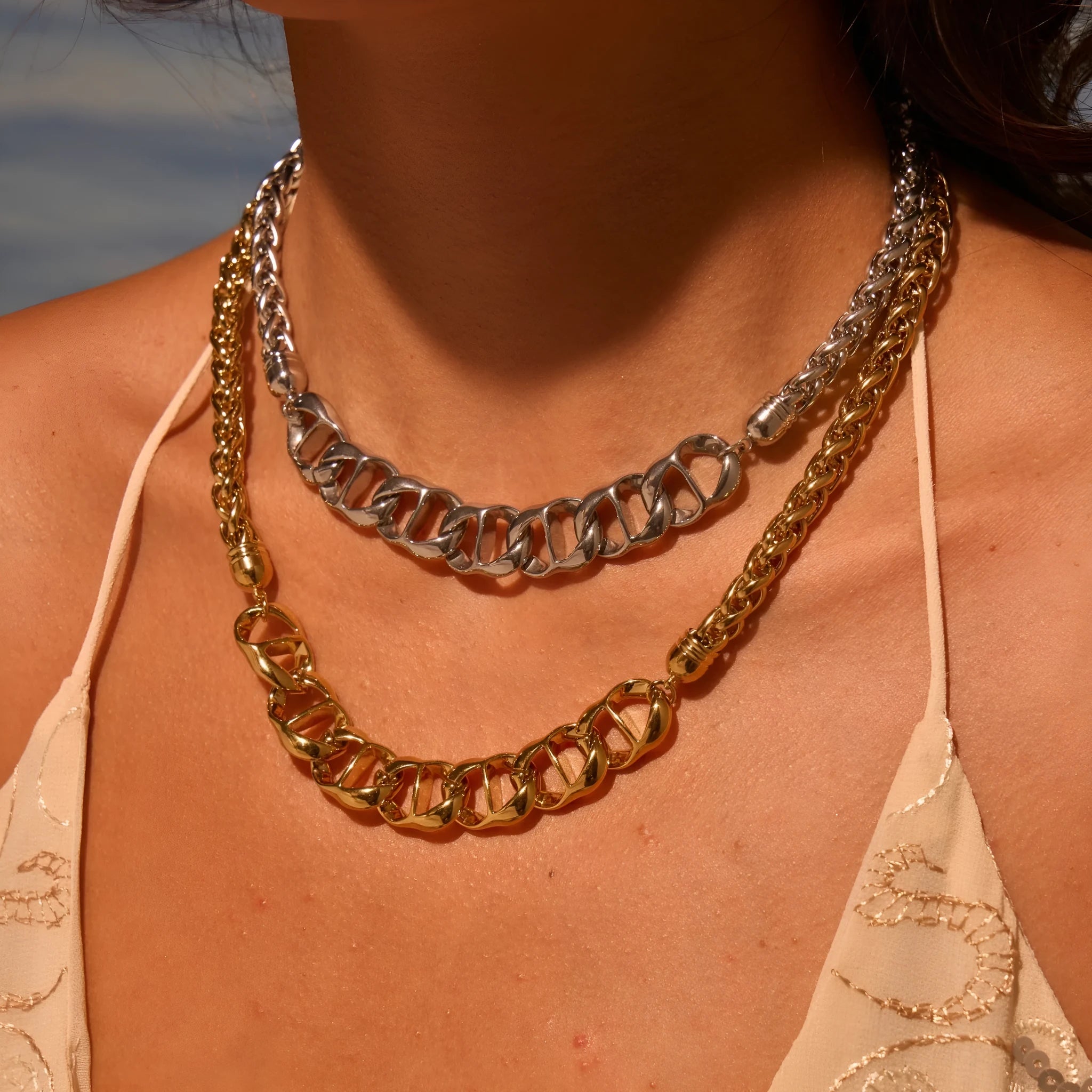 Stainless steel electroplated gold necklace with geometric chain design for women