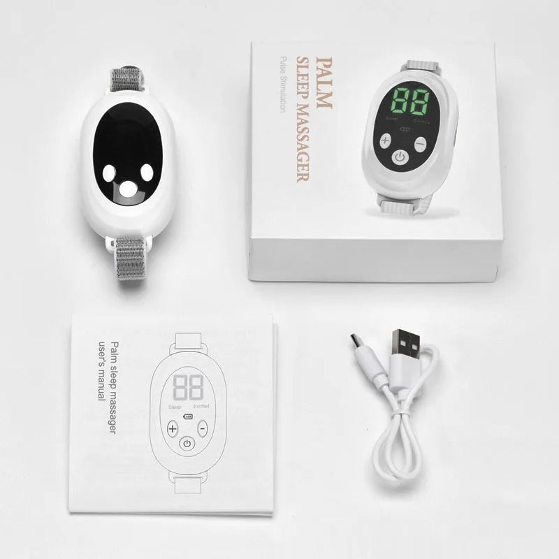 White handheld sleep aid device with remote control and wearable bracelet on charging cable