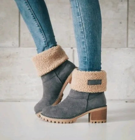 Women's suede mid-calf snow boots in multiple colours with a flat heel and round toe.