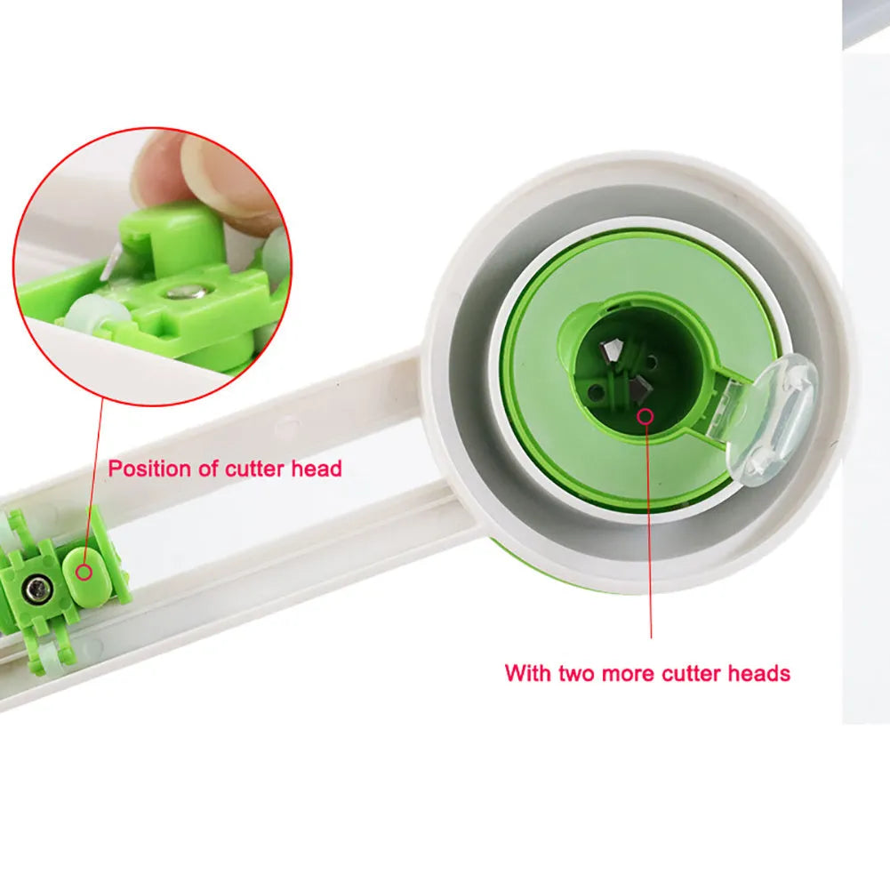 Green and orange plastic round paper cutter for A3 sheets on a colour box.