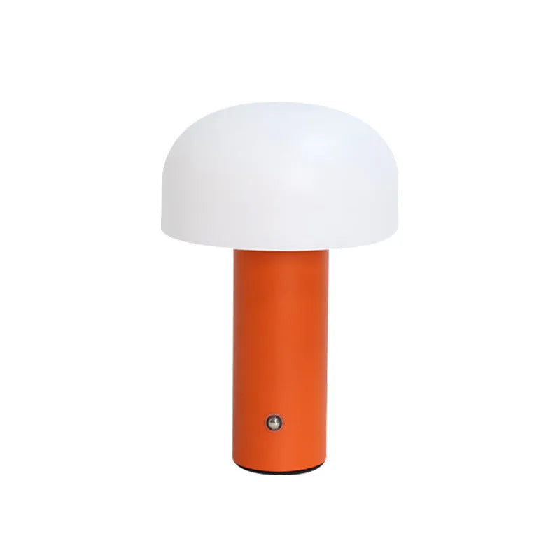 A USB-powered decorative table lamp in a choice of white, black, orange, or green colours.