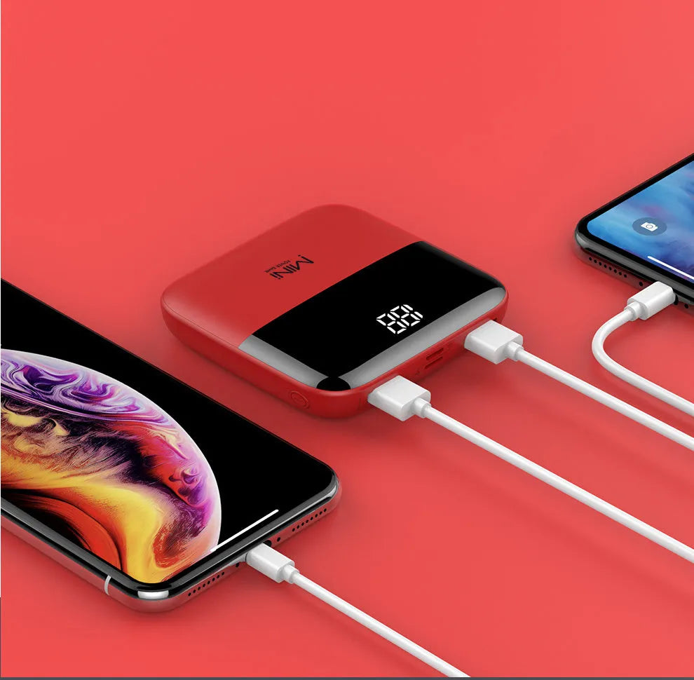 Portable 10000mAh power bank with digital display and dual USB outputs
