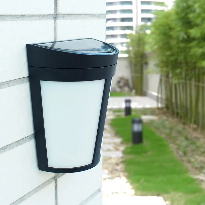Solar wall lamp with 6 LEDs and IP65 waterproof rating for outdoor garden lighting