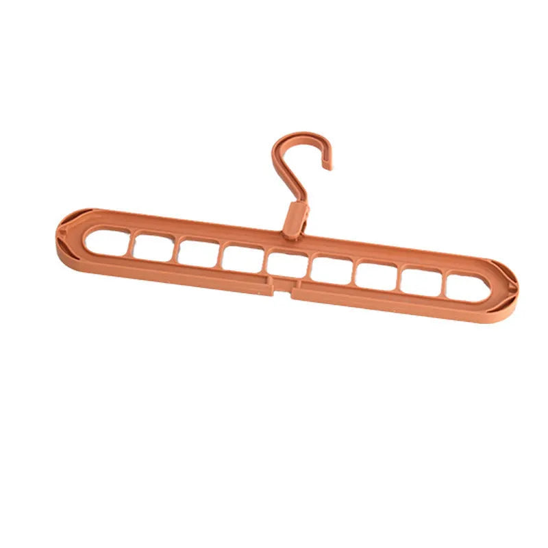 Foldable plastic hanger with nine holes for hanging trousers, shown in a choice of colours.
