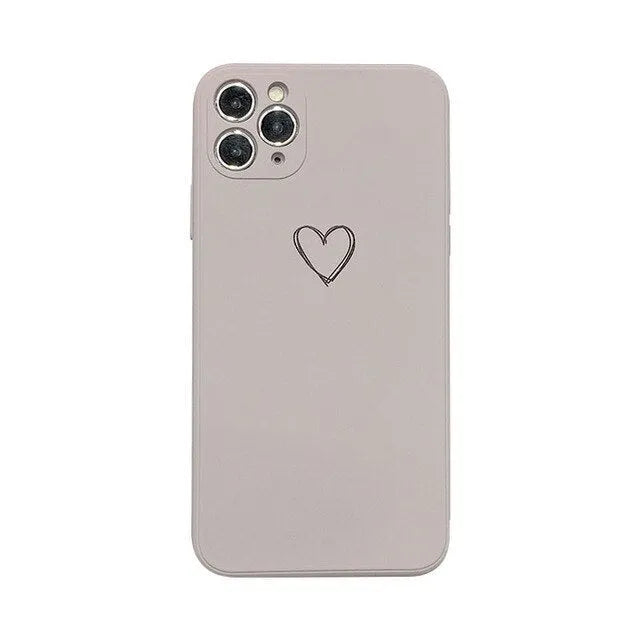 Silicone phone case for Apple iPhones in multiple solid colours including black, white, and pastel options