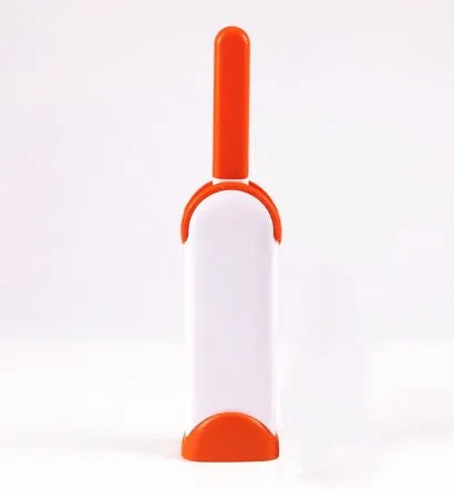 Blue reusable pet hair removal brush with self-cleaning base for furniture and clothing