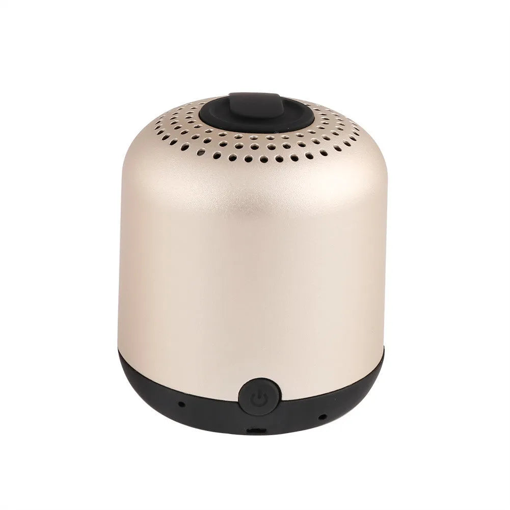 Hieha XQ11 mini Bluetooth speaker with heavy metal design in black, showing compact size and 360 degree sound capability