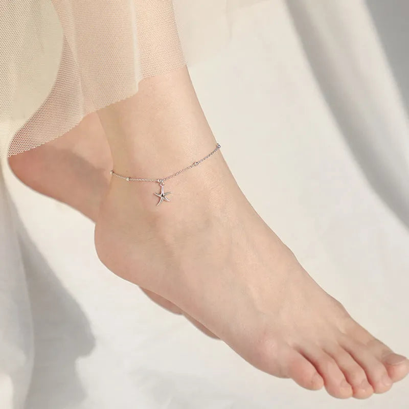 Women's S925 sterling silver anklet with a starfish charm on a round bead chain.