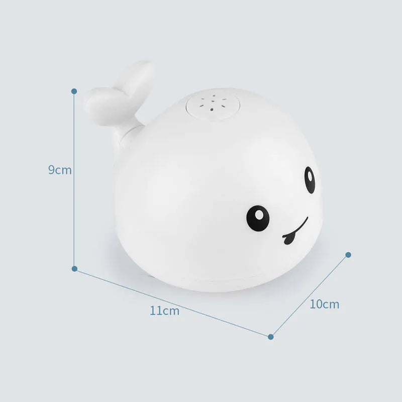 Automatic water spray whale bath toy with colourful LED lights floating in baby bath