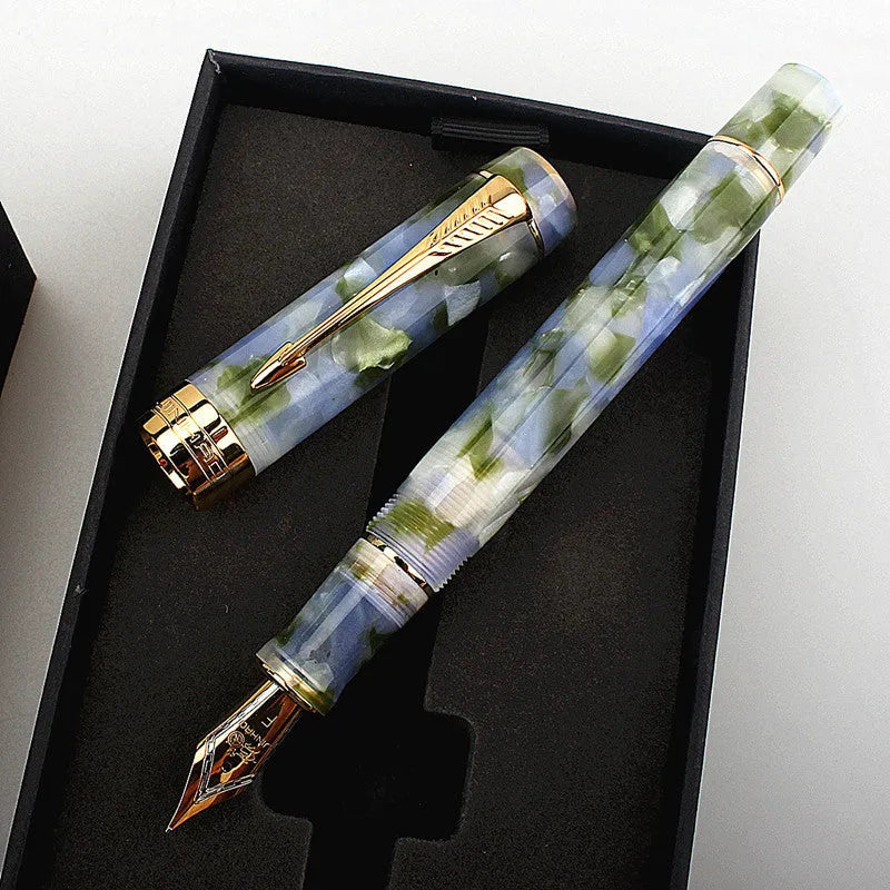 Deep bath green metal pen showing fine, medium, and broad tip size options.