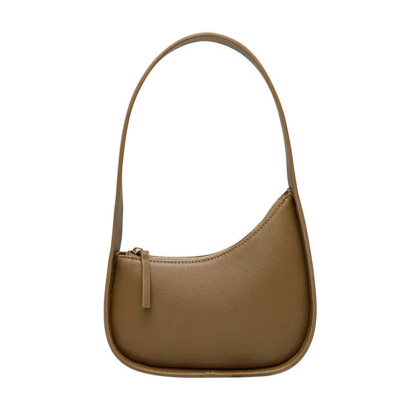 Genuine leather half moon ladies shoulder bag with wide strap and zipper closure in small size