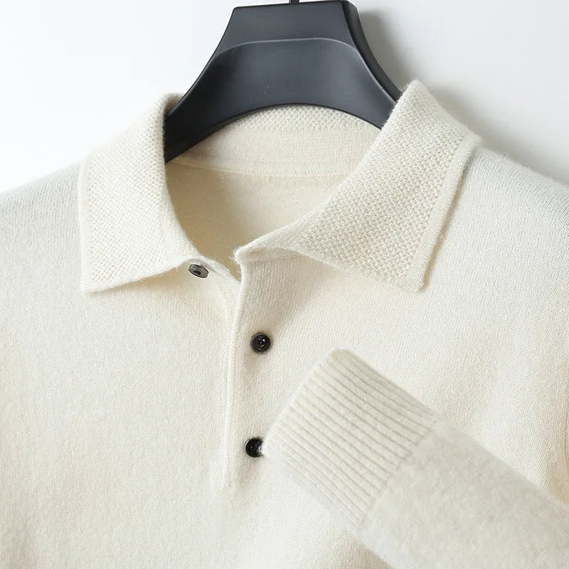 Men's grey wool pullover sweater with a polo collar and long sleeves, showing textured collage stitching.