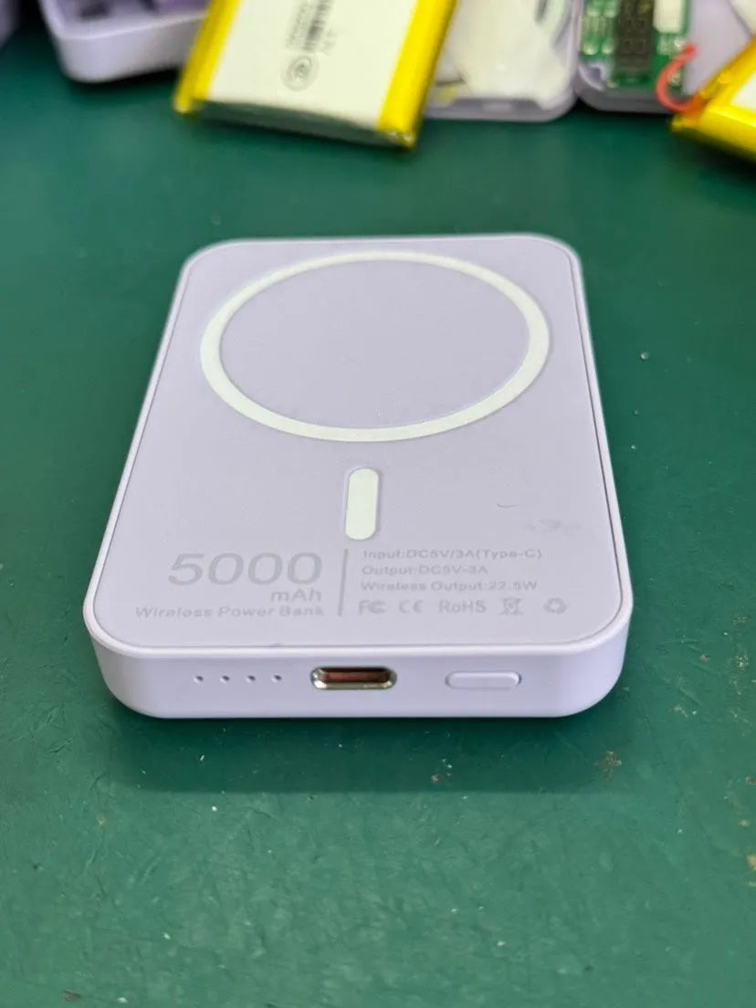 White magnetic wireless charging power bank with 5000mAh capacity measuring 100x65x16mm