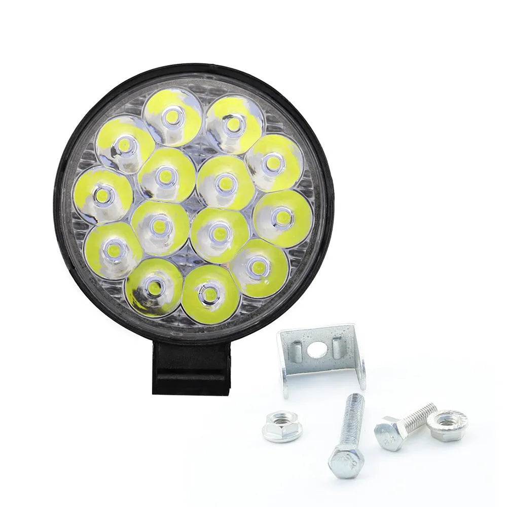Mini round aluminium LED work light with white light, 42W power and IP67 waterproof rating.