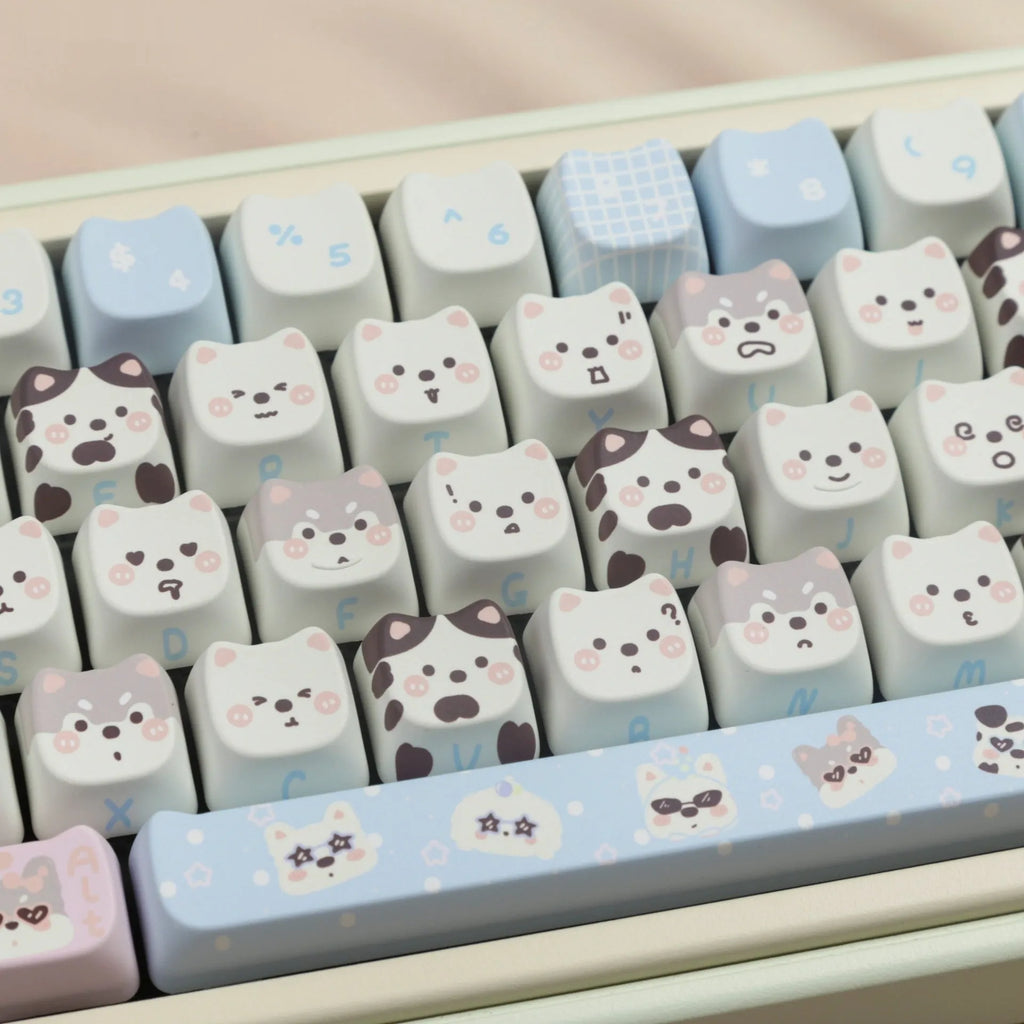 Colourful cat and puppy themed PBT key cap set for mechanical keyboards with cartoon animal artwork