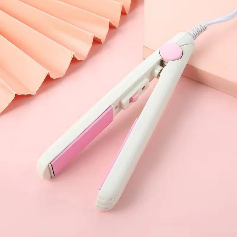 Mini hairdressing splint kit with a heated straight clip and storage box in one of five colours.