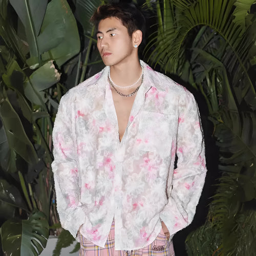 Embossed floral pattern shirt in chemical fibre blend fabric with loose fit and long sleeves