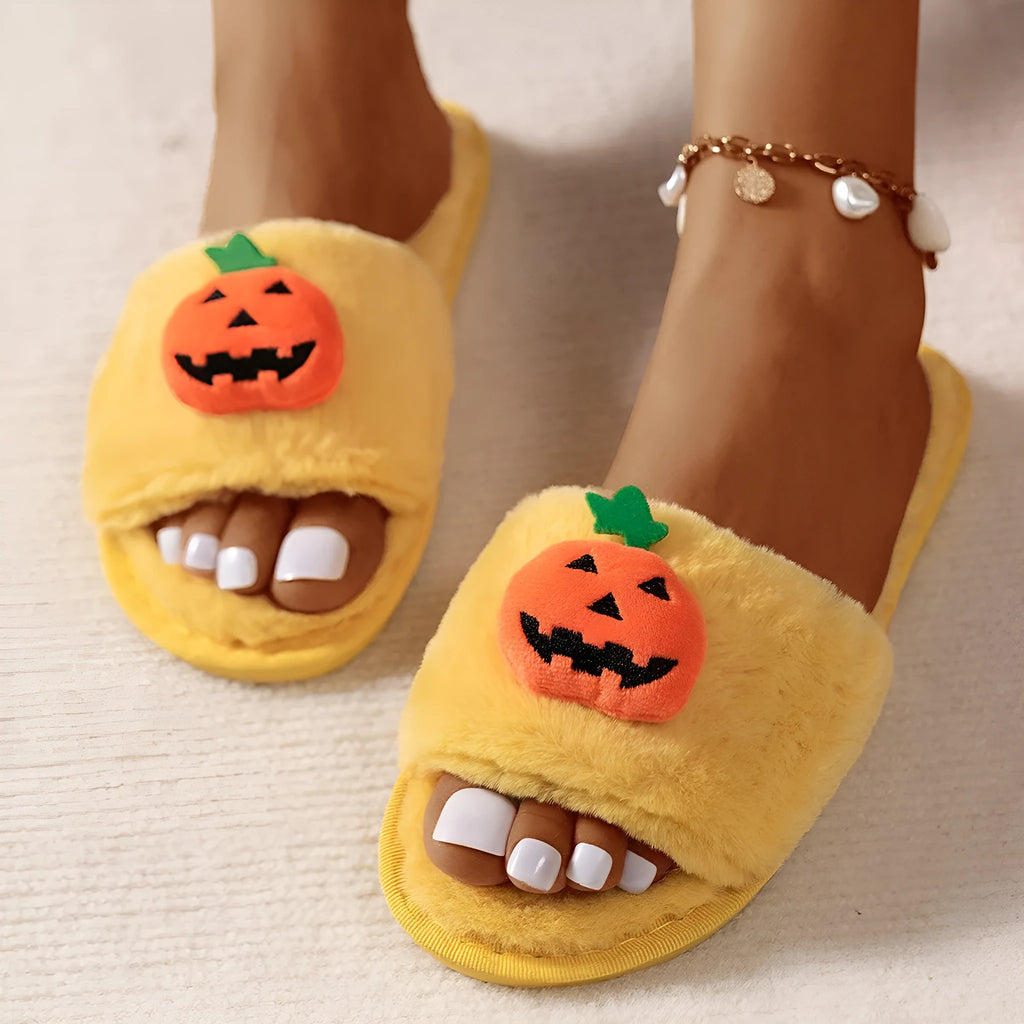 Women's Halloween pumpkin plush slippers in white and yellow with synthetic fur upper